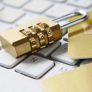 Golden padlock on keyboard representing password security